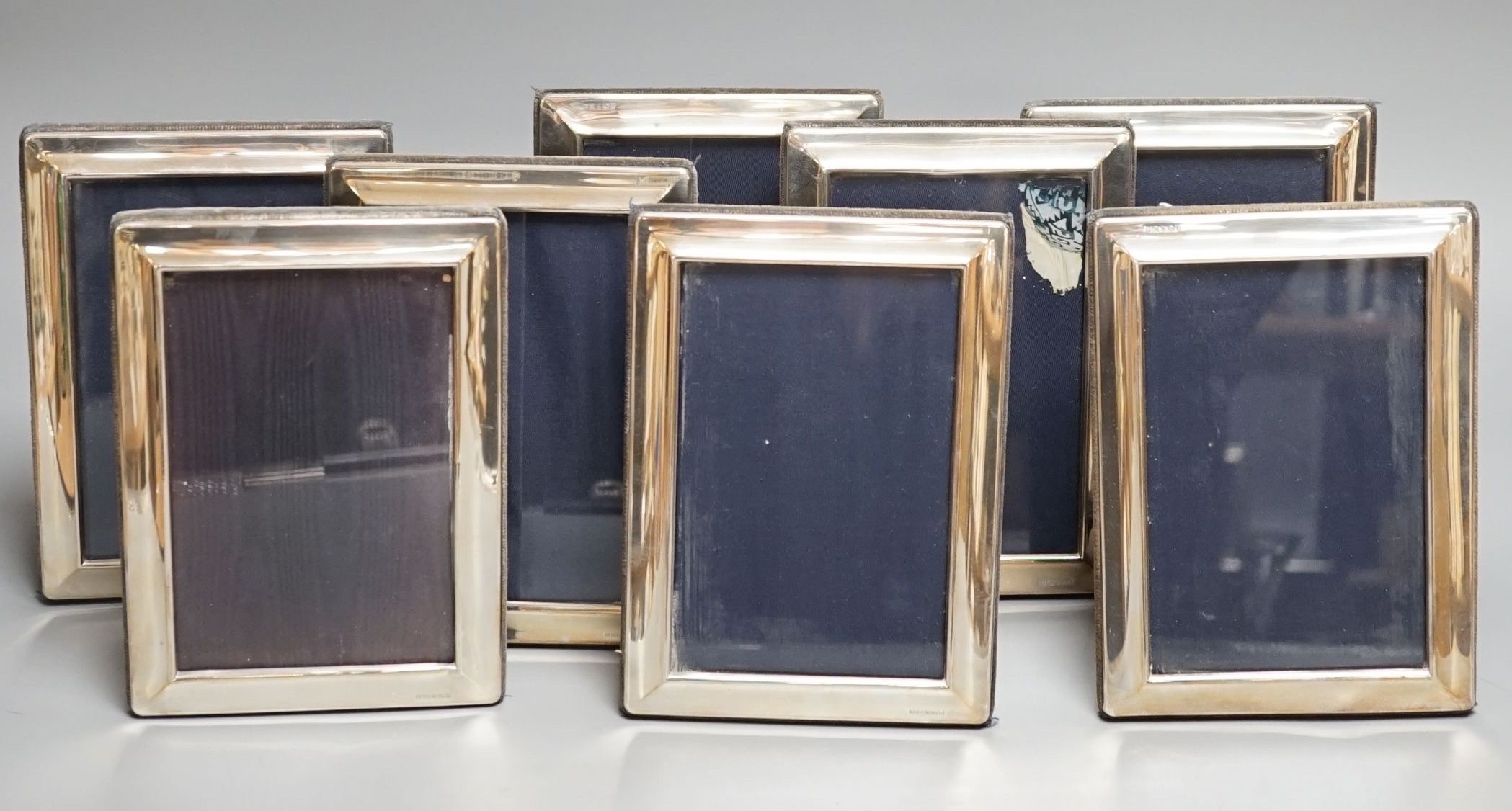 A set of eight modern silver mounted rectangular photograph frames, Carrs of Sheffield, 2001, 18cm.